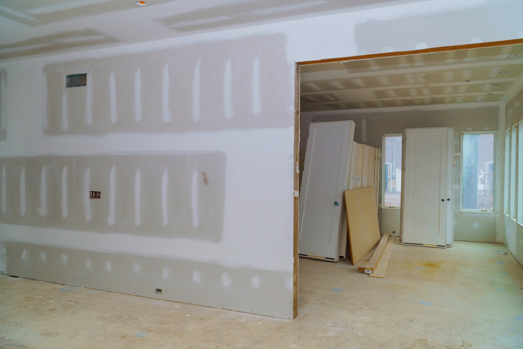 interior construction of housing with drywall installed door for a new home before installing